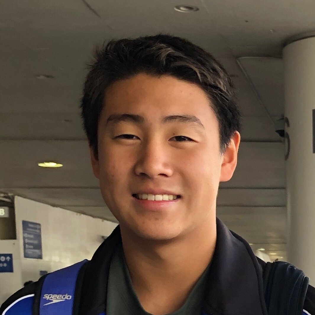 Headshot of Prinston Pan, author of Kong's Adventure, smiling in an airport terminal