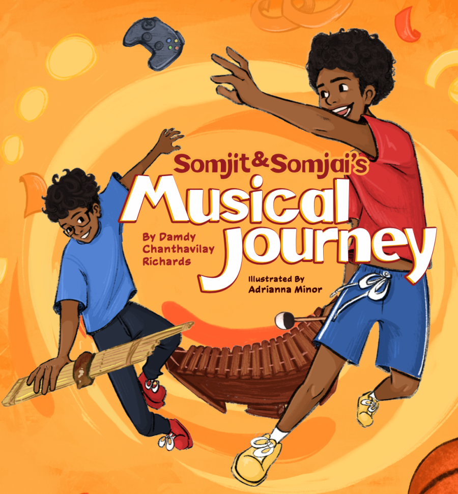 Cover of Somjit & Somjai's Musical Journey by Damdy Chanthavilay Richards, illustrated by Adrianna Minor, showing two boys leaping with a game controller and Lao instruments